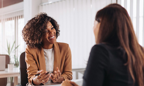 Two business people in office room consultation